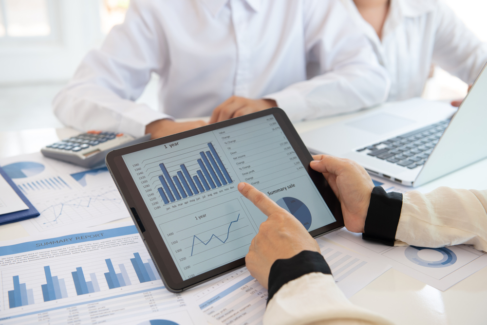 A business man comparing Houston Data Assessment for issues - Allston Yale