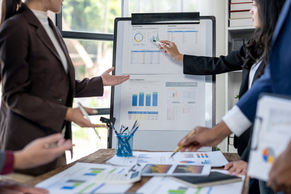 a group of IT developers discussing on Houston data visualization - Allston Yale